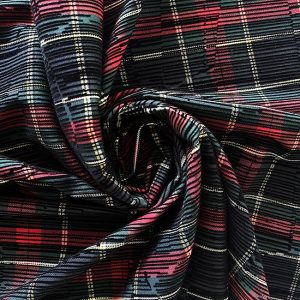 Poly-viscose with Prince of Wales design and Flock print