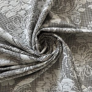 Poly-viscose with houndstooth design and floral Flock print